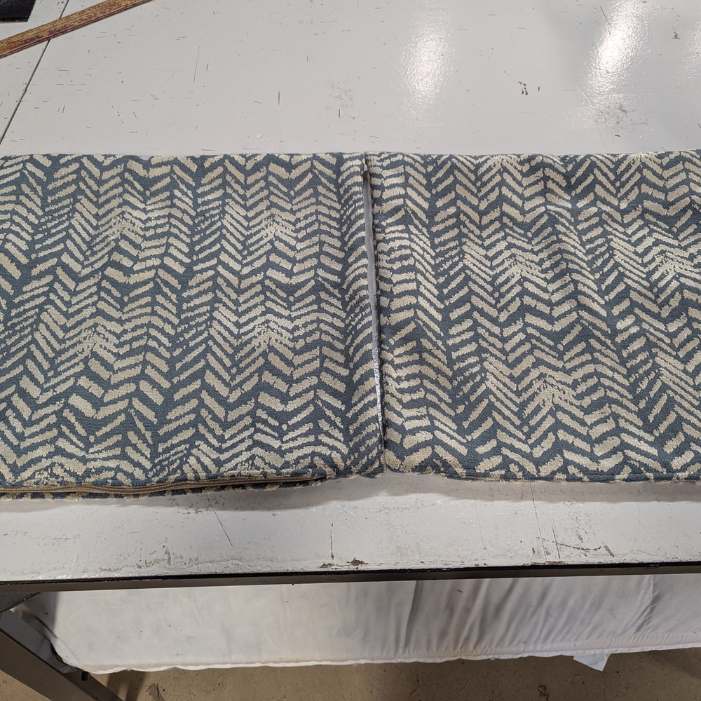 Gray and Cream Patterned Cushion